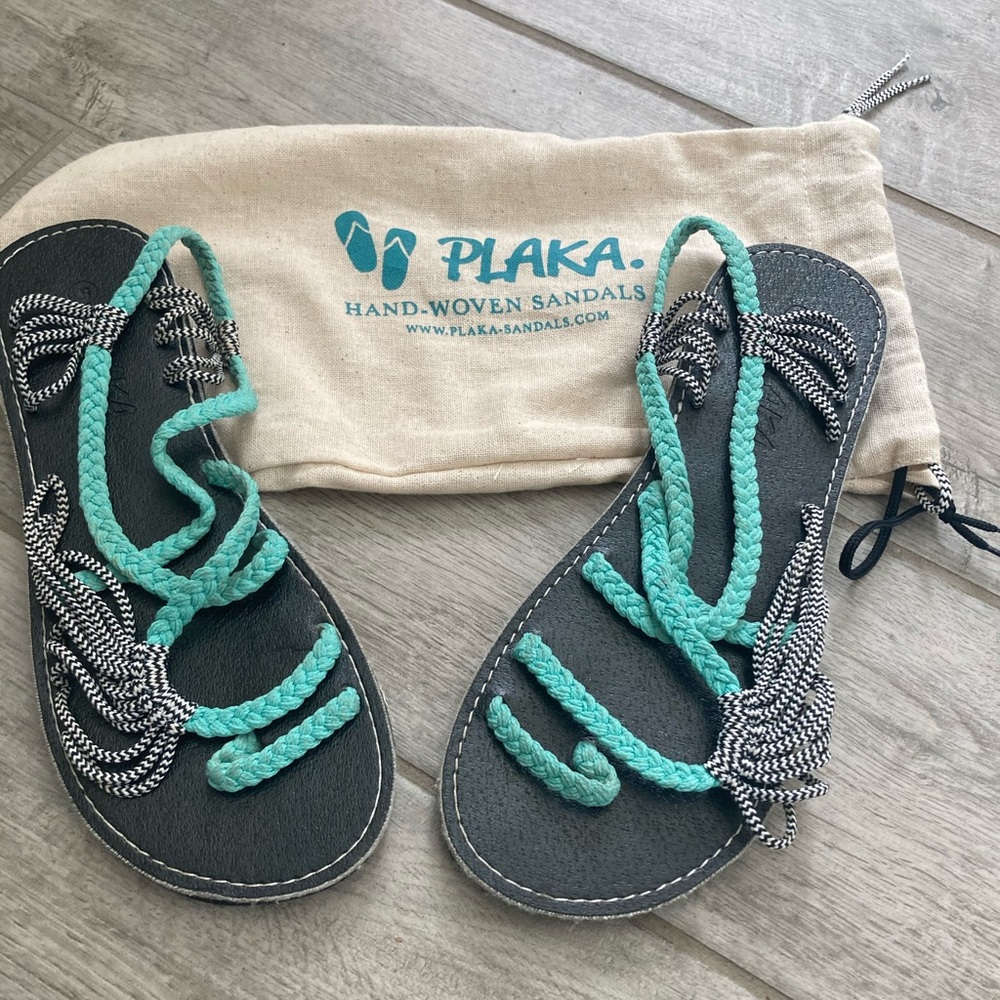 Plaka sandals. Like new. Worth dust bag.